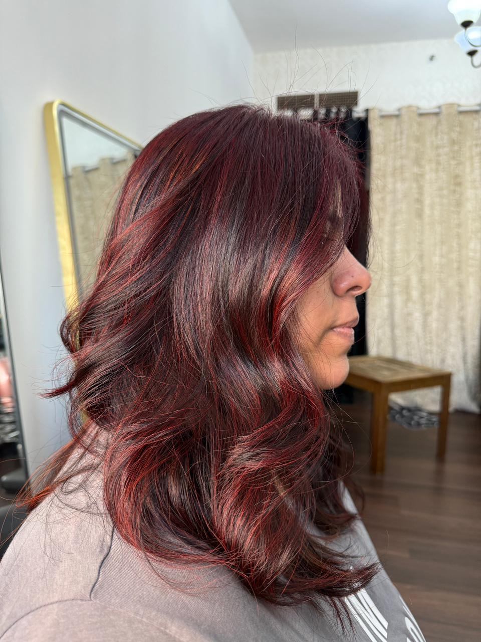 Cherry red colour on dark hair