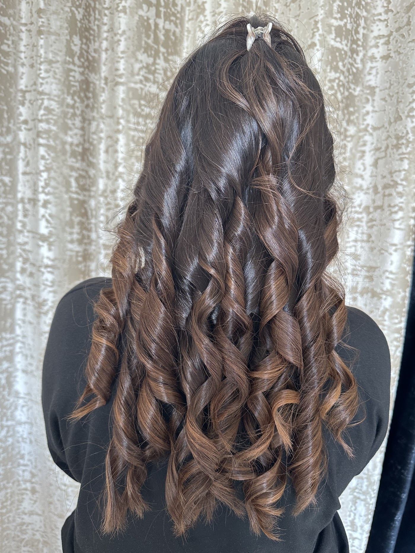 Defined glossy curls
